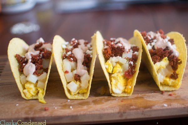 Spicy Breakfast Tacos: Filling and perfect for breakfast, these spicy breakfast tacos are filled with scrambled eggs, chorizo, potatoes o'brien, and a creamy sauce on top.