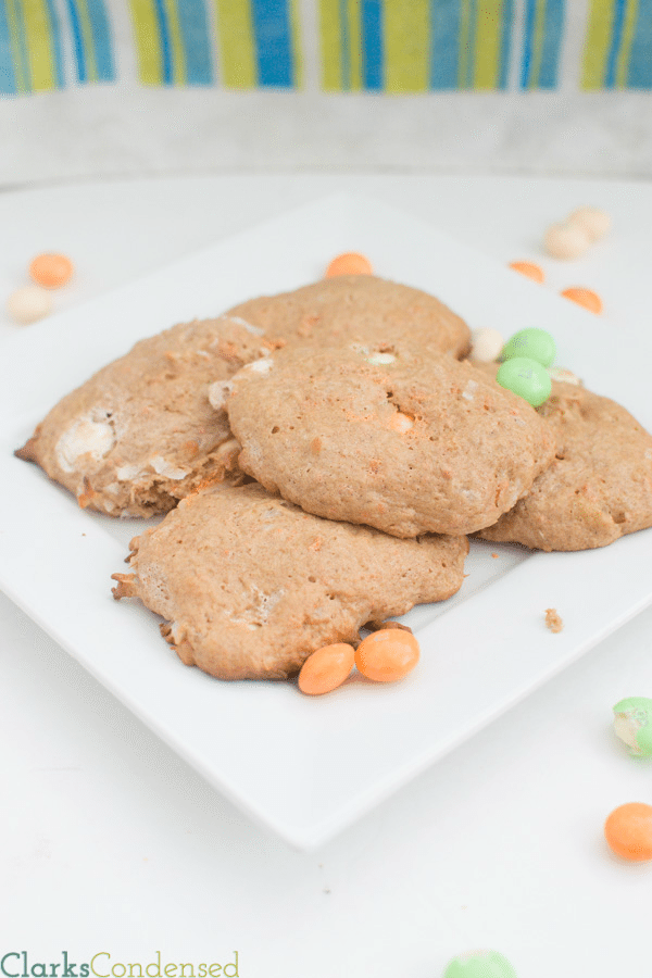 Carrot Cake Cookie Recipe: These cookies are simple, soft, and delicious! Made with a cake mix, these carrot cake cookies just very cake-like because of pineapple, and the added addition of carrot cake M&Ms (or white chocolate chips) help make them melt in your mouth!