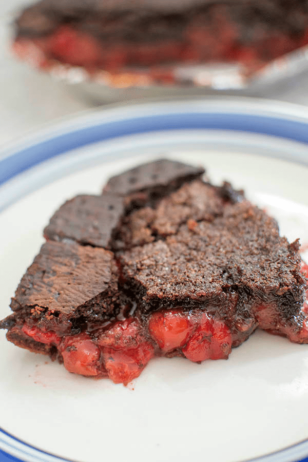 Cherry Chocolate Pie: A decadent cherry pie, made with a chocolate based crust and topped off with a chocolate graham cracker topping. This is definitely not your Grandma's cherry pie recipe (though that's probably delicious too!)