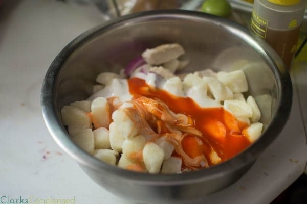 This potato and buffalo chicken casserole is super easy to throw together and absolutely delicious! It has potatoes, ranch dressing, bacon, onions, cheese, panko, and more!