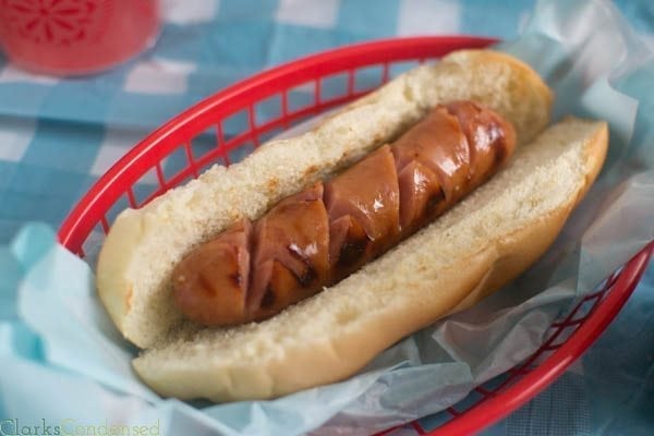 sausage with criss crosses, sitting in a basket