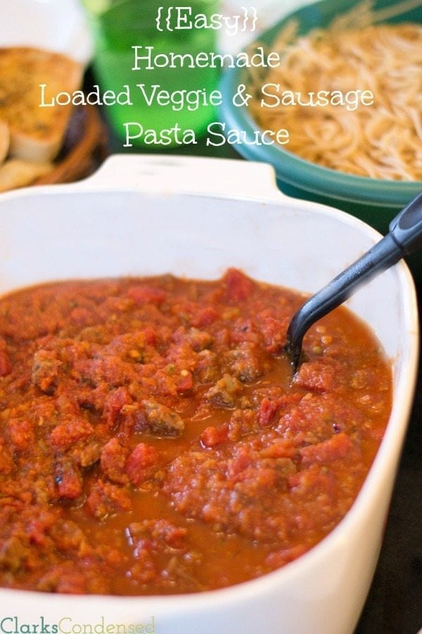 Easy Homemade Spaghetti Sauce loaded with veggies and sausage. Your pickiest eater won't even know there are extra veggies in this!