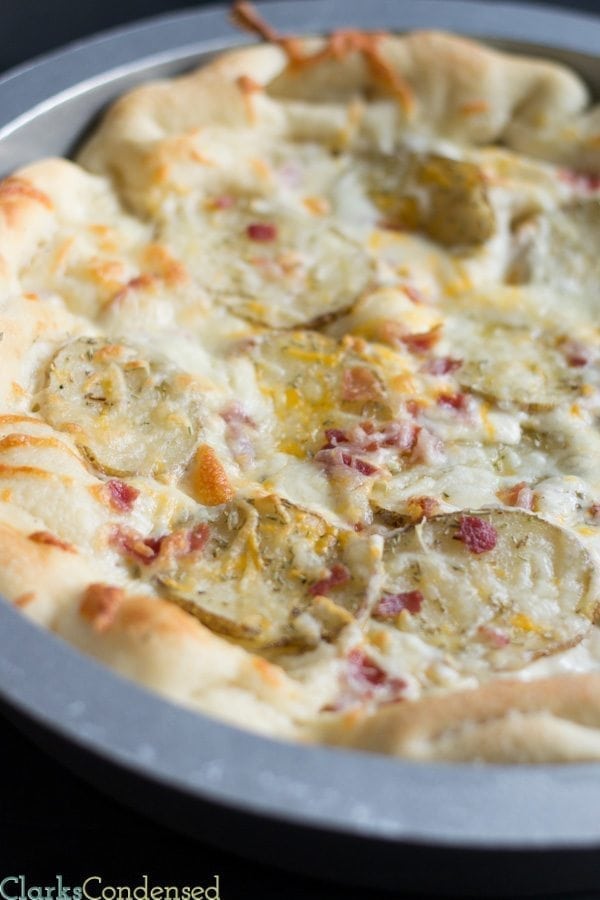 This Bacon and Potato pizza is topped with a creamy ranch sauce, seasoned potato slices, crispy bacon, and a combination of cheddar and mozzarella cheese. Definitely a great choice for any pizza night! 