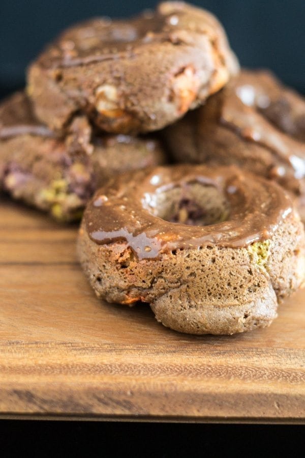 A great gluten free doughnut recipe featuring Reese's peanut butter cups (don't worry, it can be made with regular flour, too!) 