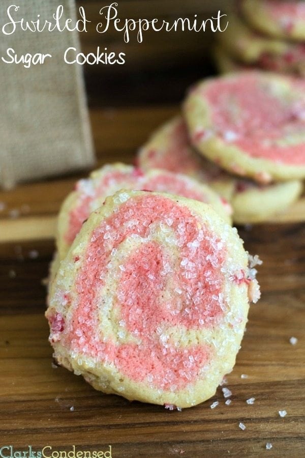 This swirled peppermint sugar cookie recipe, coated in Andes peppermint chips and topped with sugar crystals, are not only pretty but absolutely delicious. 