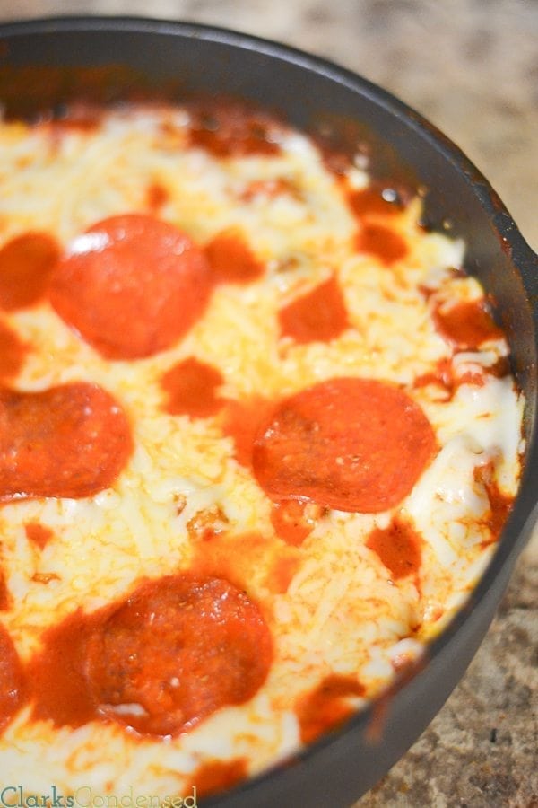 Dinner doesn't get easier than this one pot pizza casserole. It's full of sausage, pepperoni, and gooey mozzarella cheese. It's one of our new family favorites. 