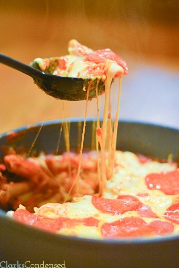 Dinner doesn't get easier than this one pot pizza casserole. It's full of sausage, pepperoni, and gooey mozzarella cheese. It's one of our new family favorites. 