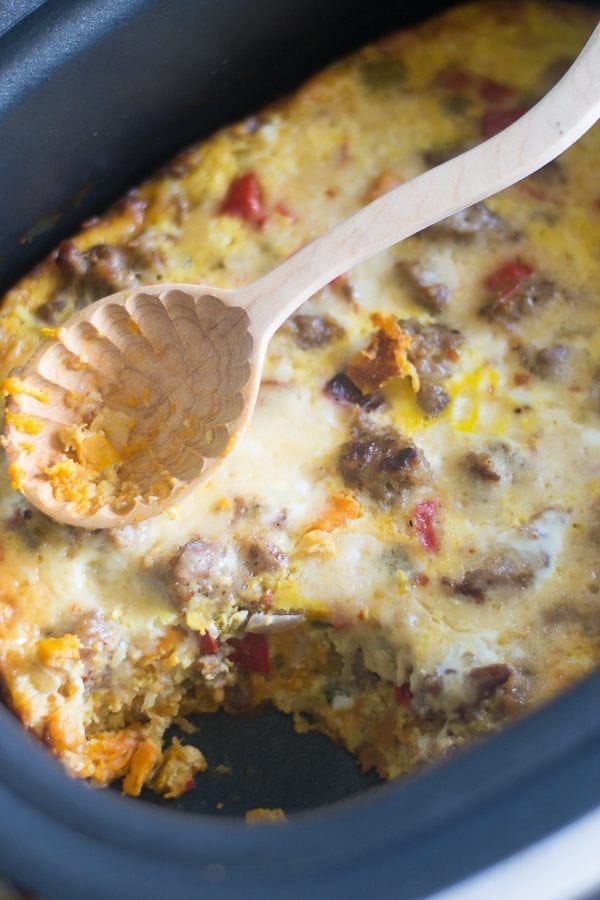 This easy slow cooker breakfast casserole will be a hit with everyone you share it with! One of our favorite meals. 