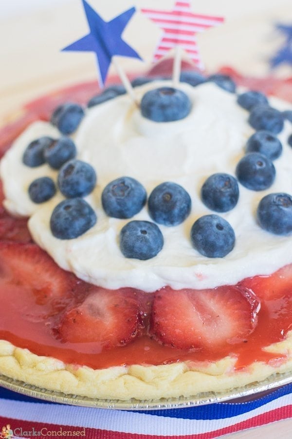 An easy strawberry pie recipe that can be a no-baked dessert (if you use a graham cracker crust.) When topped with blueberries and whipped cream, this dessert becomes the perfect Red, White, and Blue pie recipe for Fourth of July!