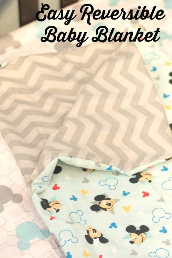 An easy reversible baby blanket tutorial - this is a great DIY baby shower gift that requires very little sewing. The blanket is so soft!