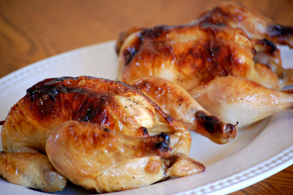 two cornish game hens on a platter