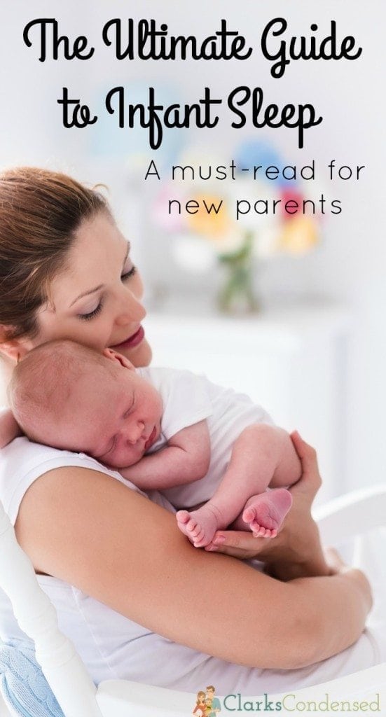 Young mother holding her newborn child. Mom nursing baby. Woman and new born boy relax in a white bedroom with rocking chair and blue crib. Nursery interior. Mother breast feeding baby. Family at home