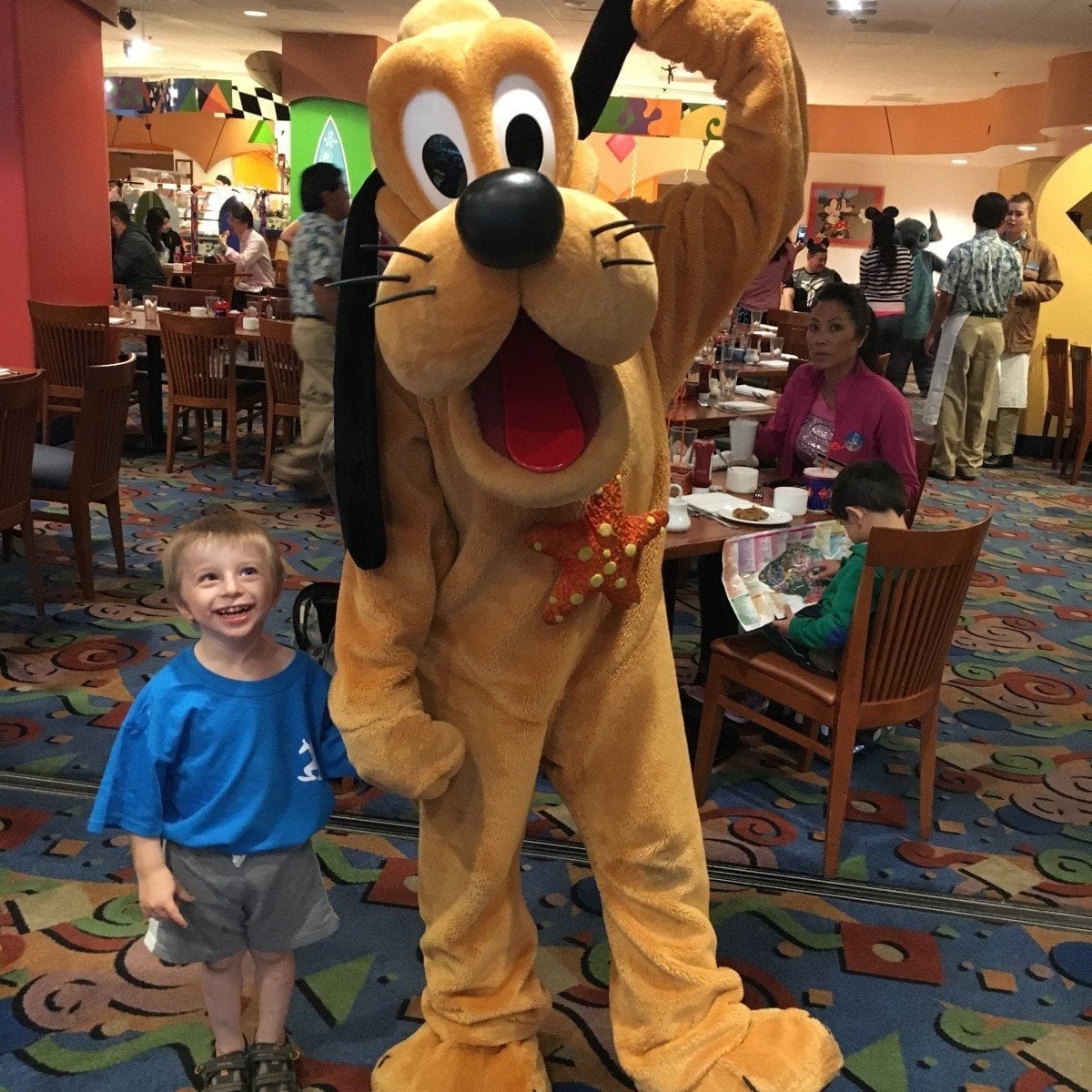 little boy with goofy