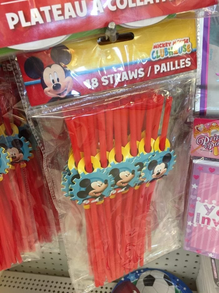 A group of Mickey mouse straws on display