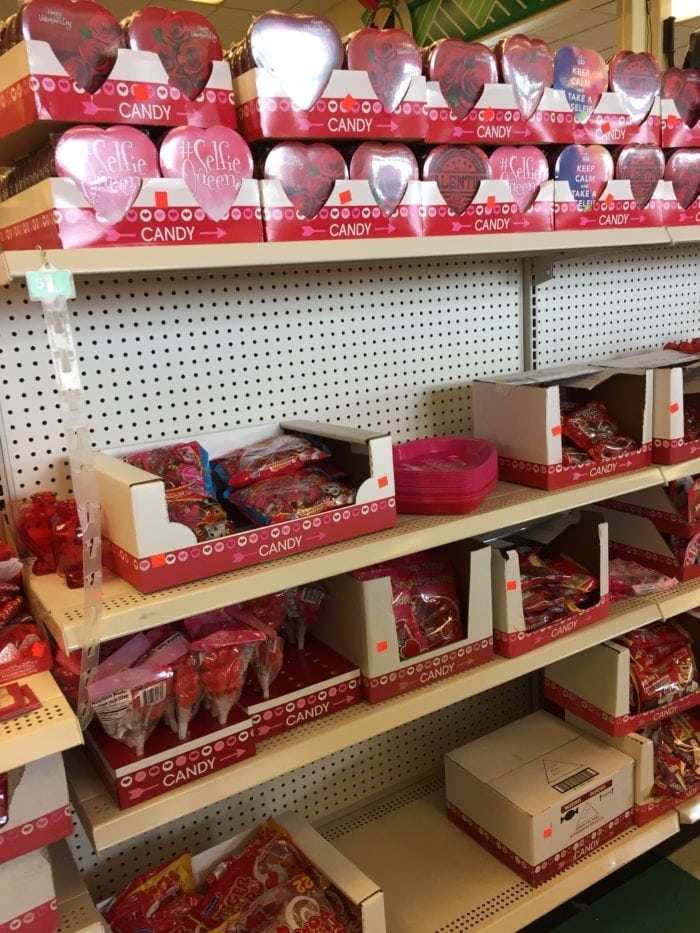 A store shelf filled with Candies and other stuff for Easter