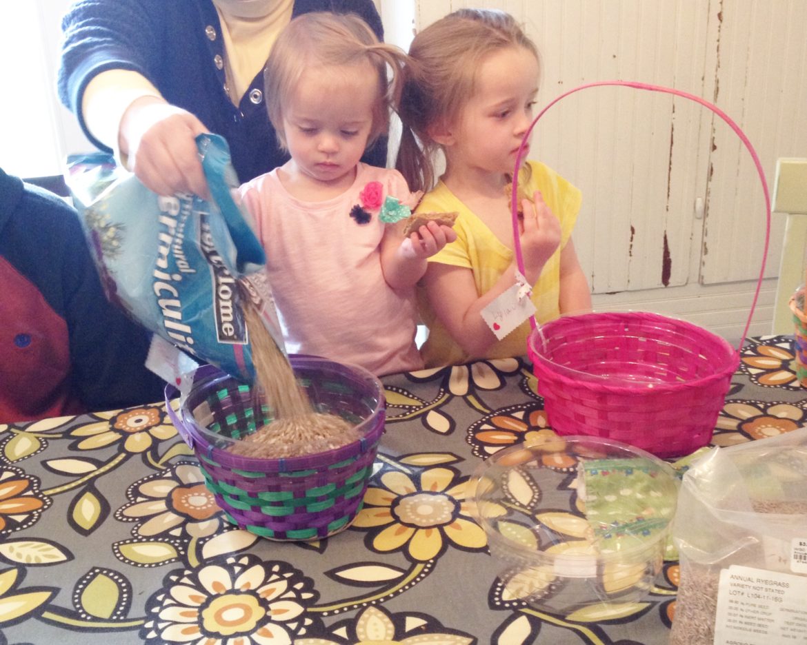 Children creating DIY Easter Baskets