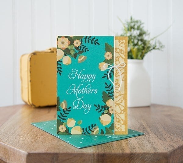 turquoise card with flowers. 