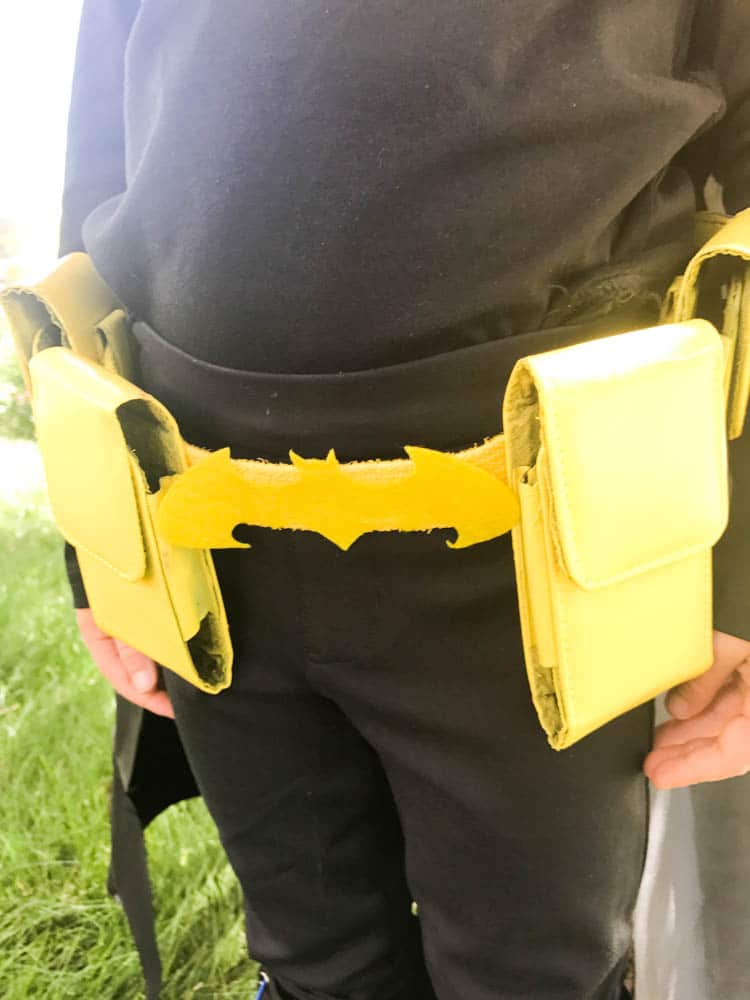 close up of yellow utility belt for batman belt 