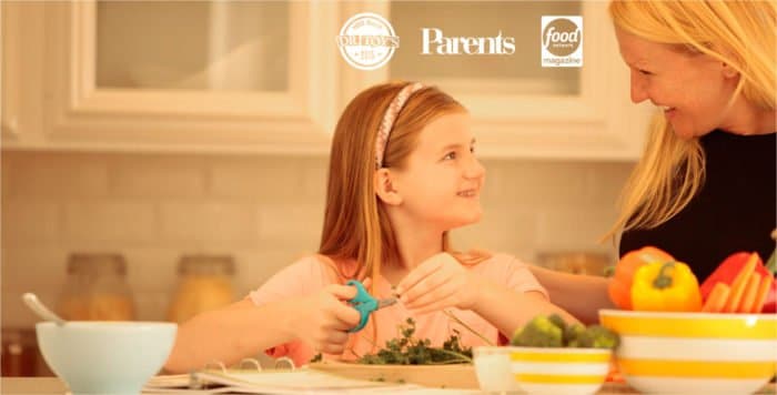 A girl preparing food in a kitchen