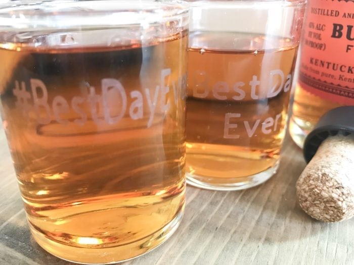 A glass of beer on a table, with Wedding and Cricut