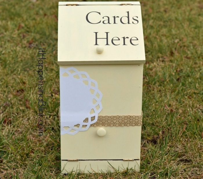 A sign sitting on the grass