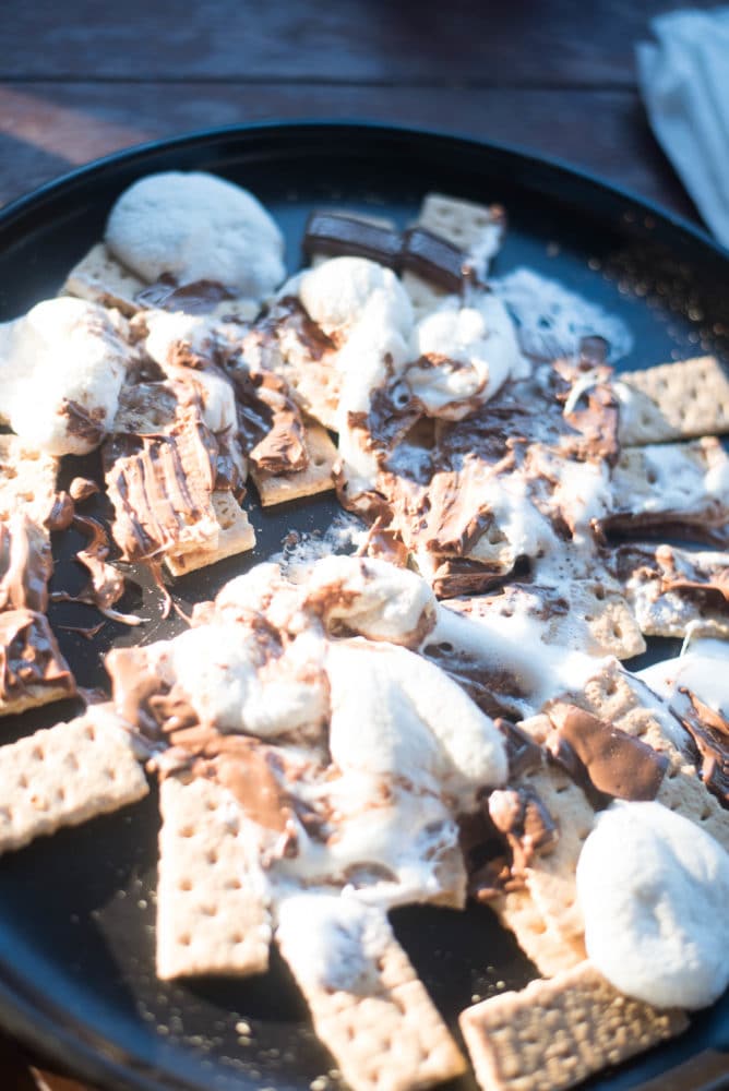 A pan of food on a plate, with Traeger and Smoking