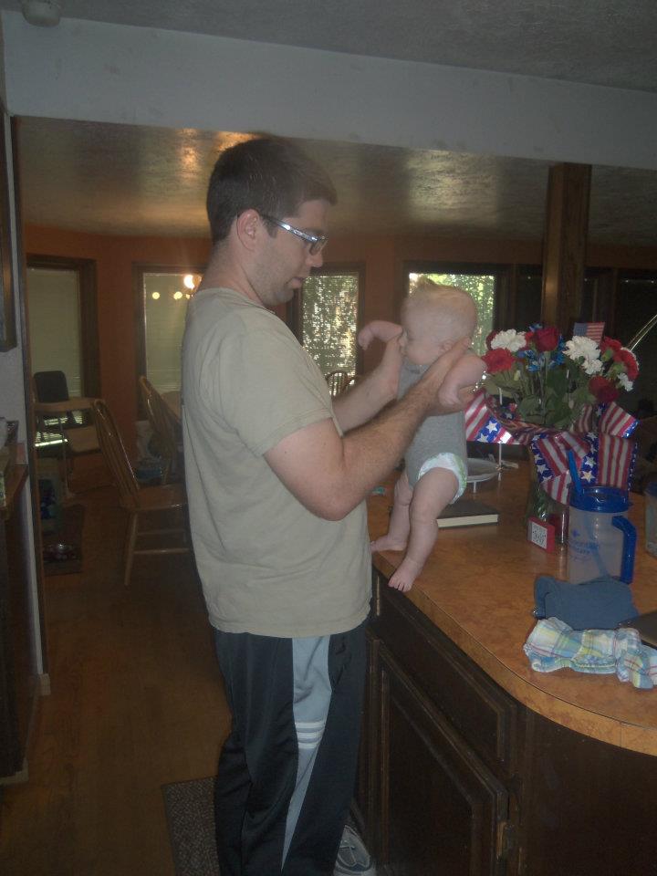 A man holding his baby