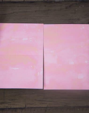 Closeup of a pink paper on table