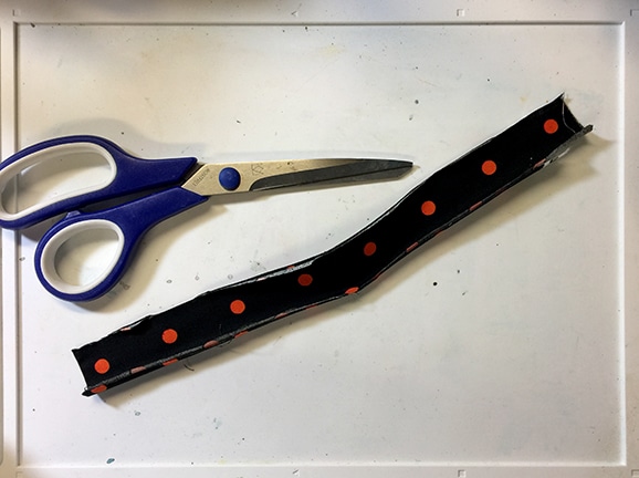 scissors next to fabric