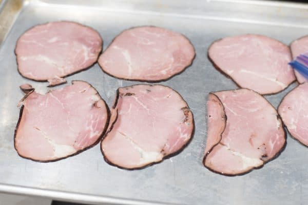 A tray of food, with Ham and Potato