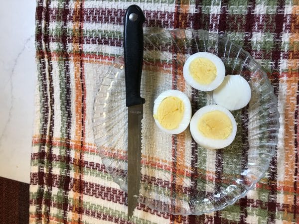 A close up boiled eggs on a plate