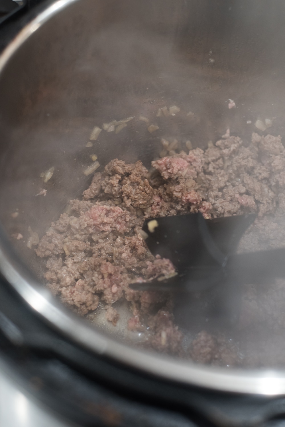 A close up of a metal pan on a stove, with Beef Stroganoff and Recipes