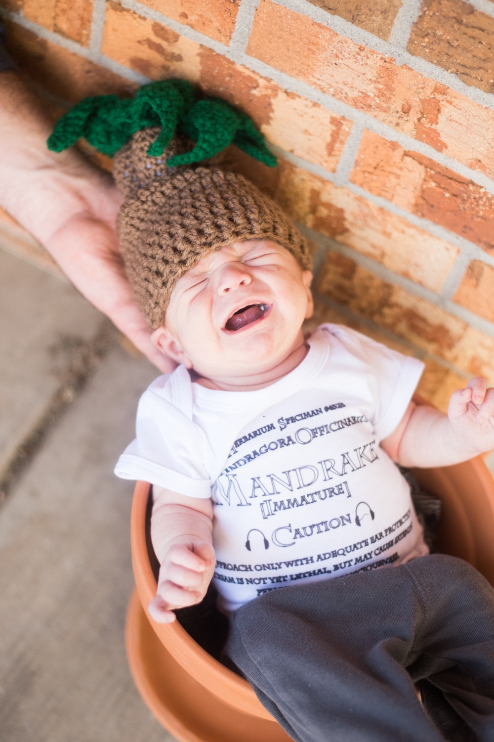 A little boy wearing a hat