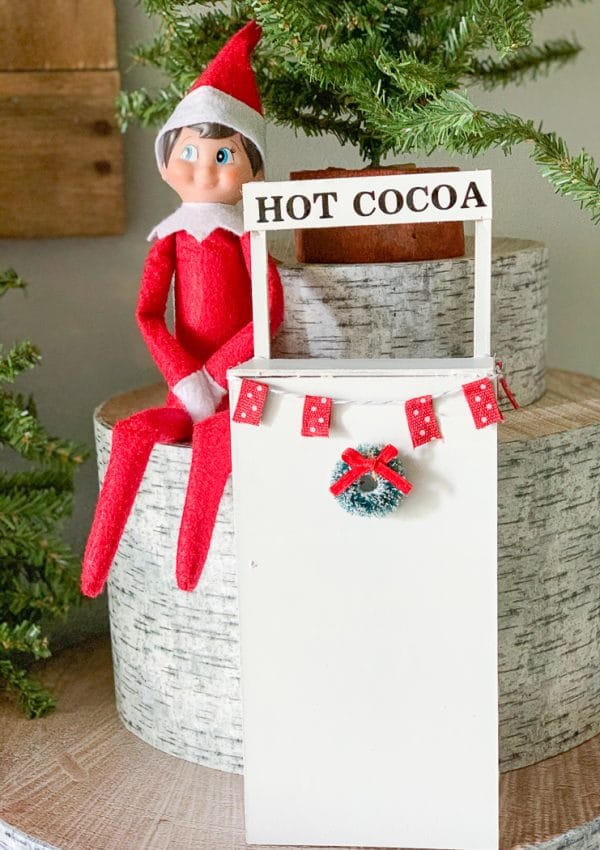 An elf near hot cocoa stand