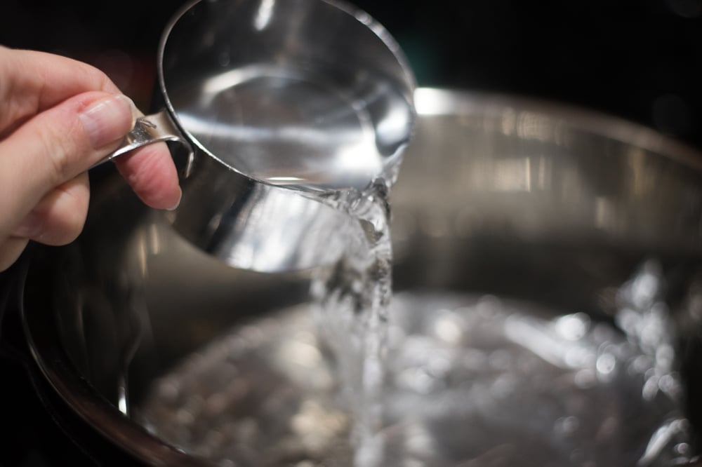 Pouring water from a container