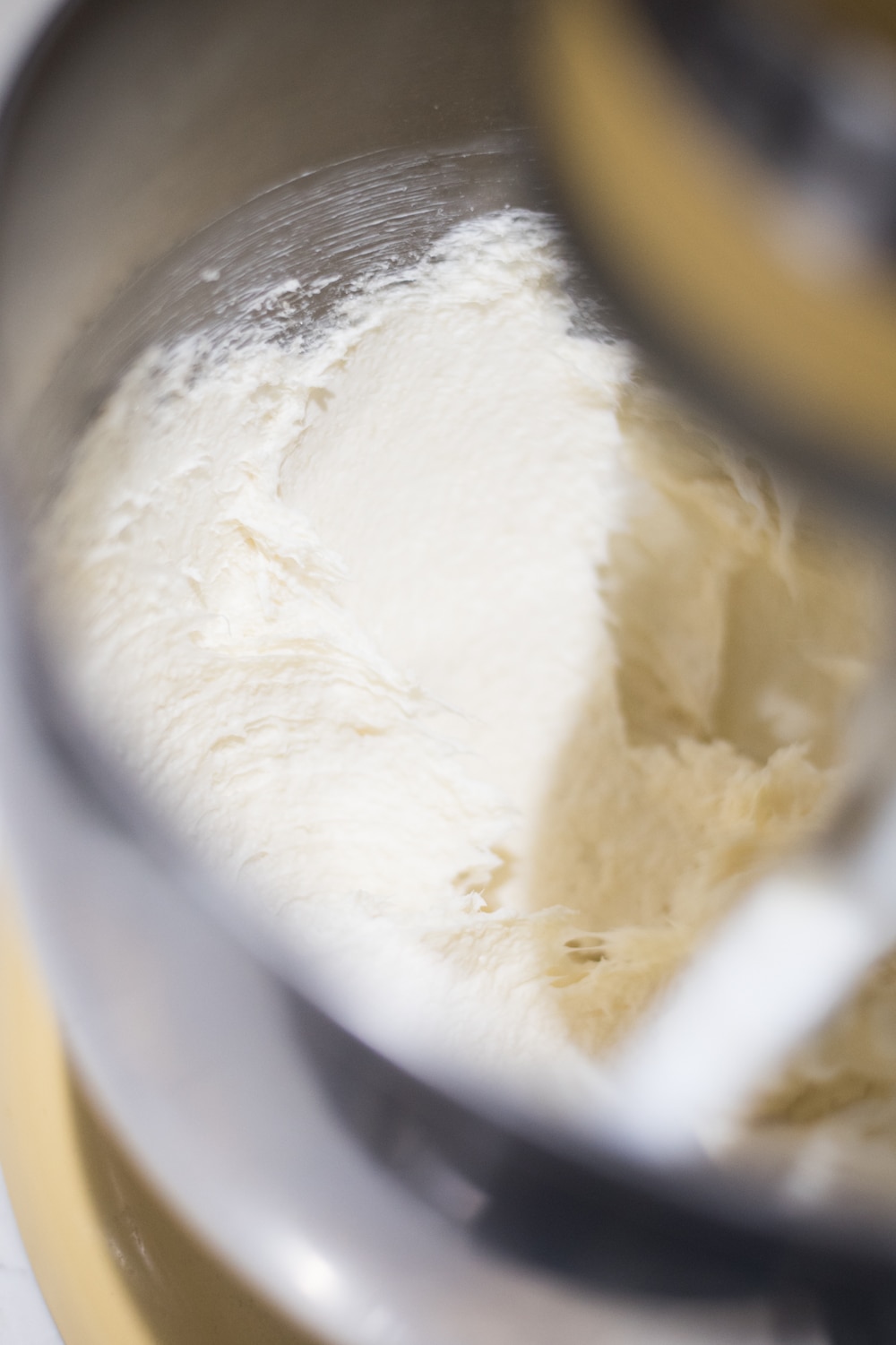 A close up of a bowl, with cake batter