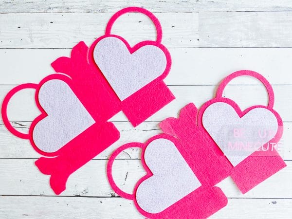 A close up of heart shaped pieces of paper DIY valentines