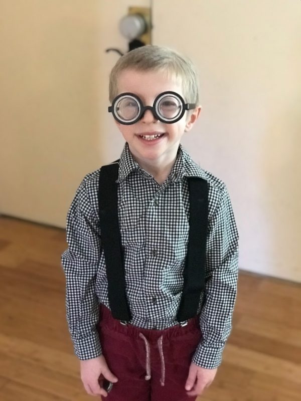 A kid wearing glasses