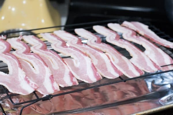 A close up of a metal pan, with Bacon