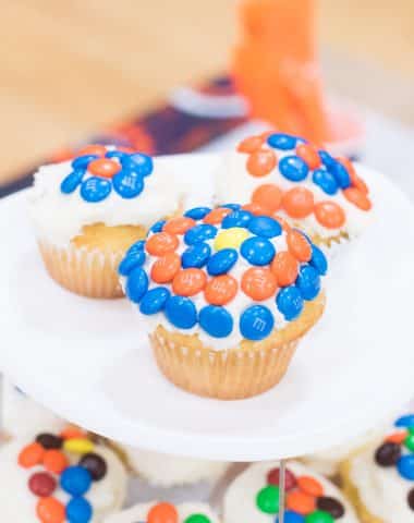 A decorated cake on a plate, with Party