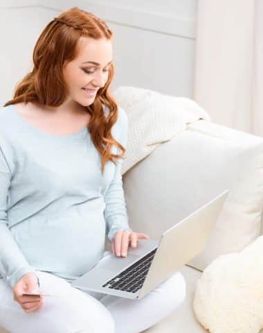 A woman sitting on a bed