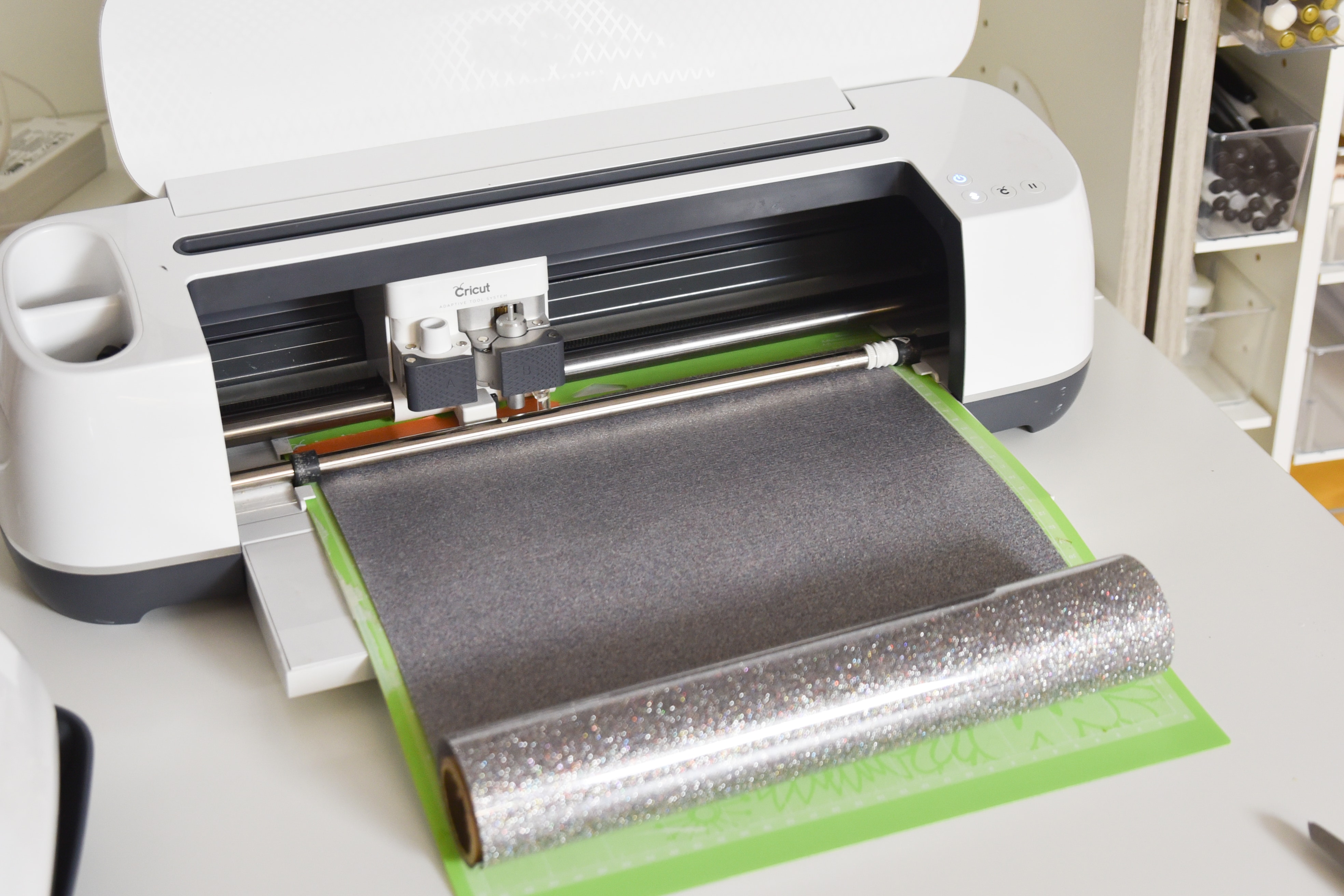 cricut maker cutting out glitter vinyl iron on