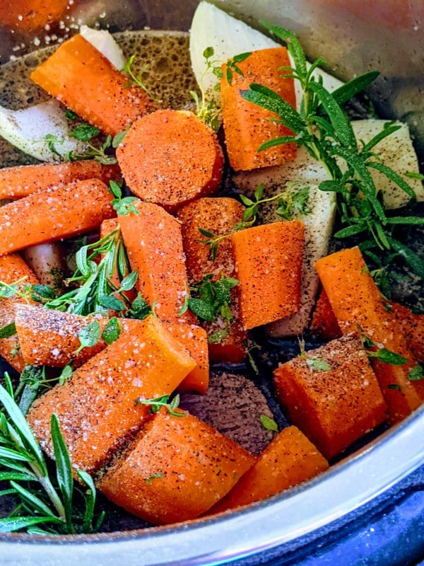 seasoned carrots, potatoes, and roast in instant pot