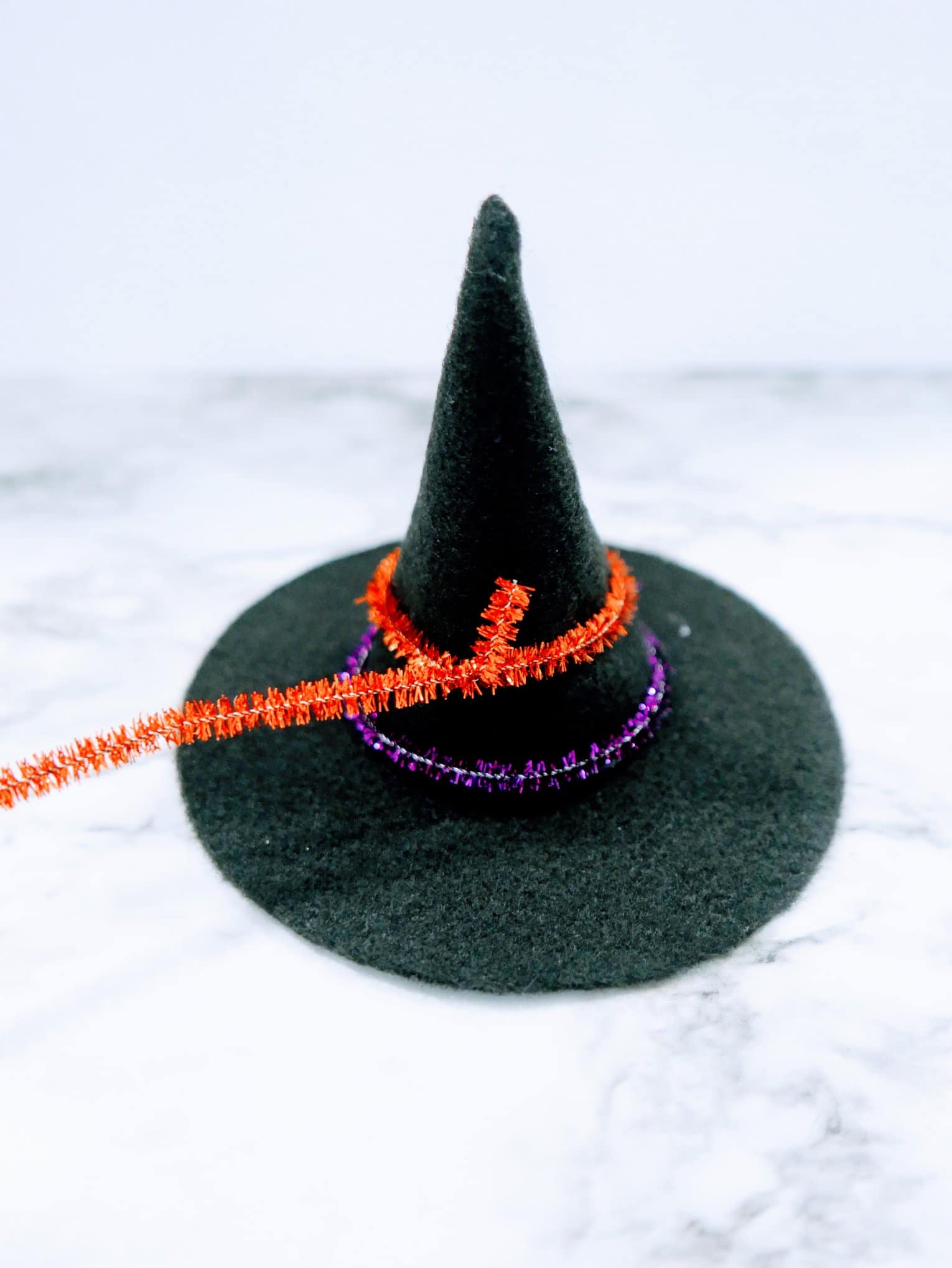 felt witches hat with pipe cleaners