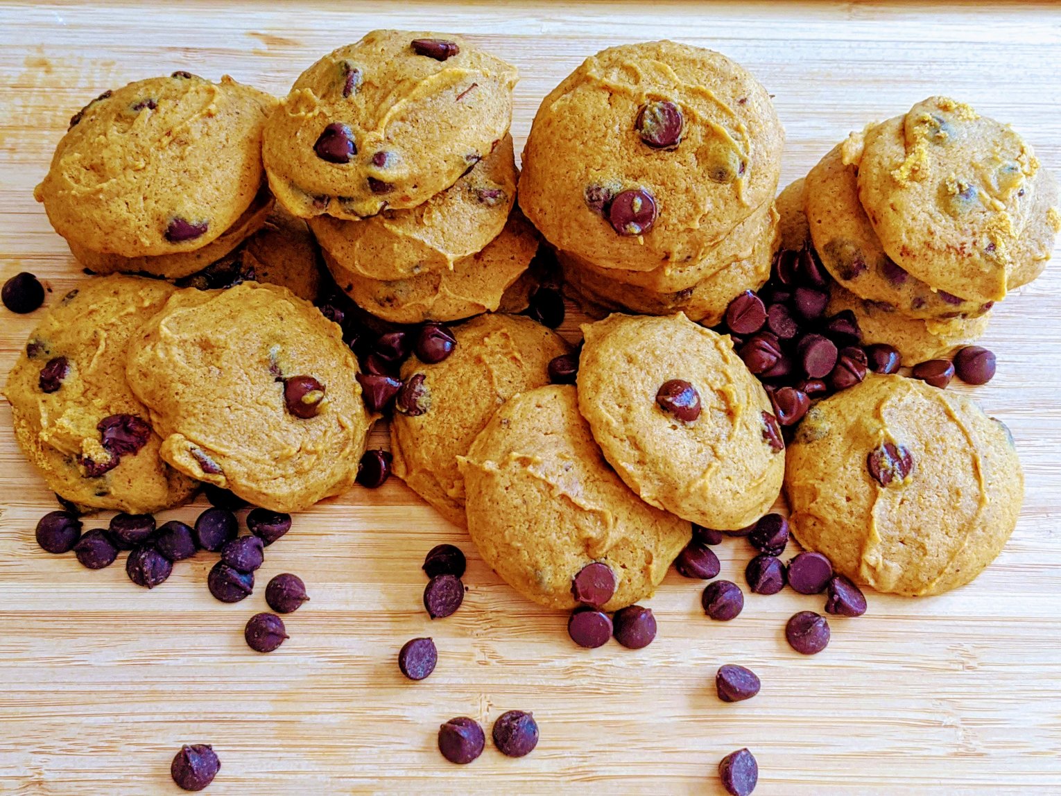 pumpkin chocolate chip cookies on a cutting board