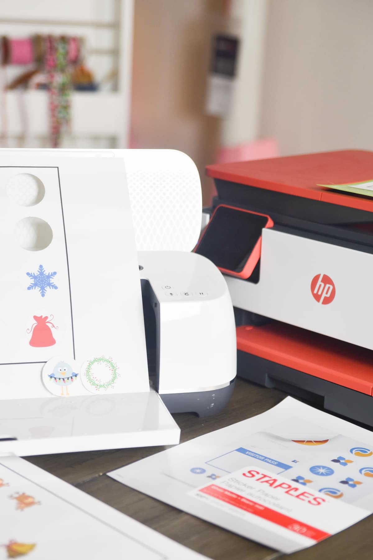 Cricut maker next to HP Printer