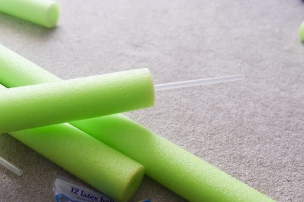 balloon stake through pool noodle