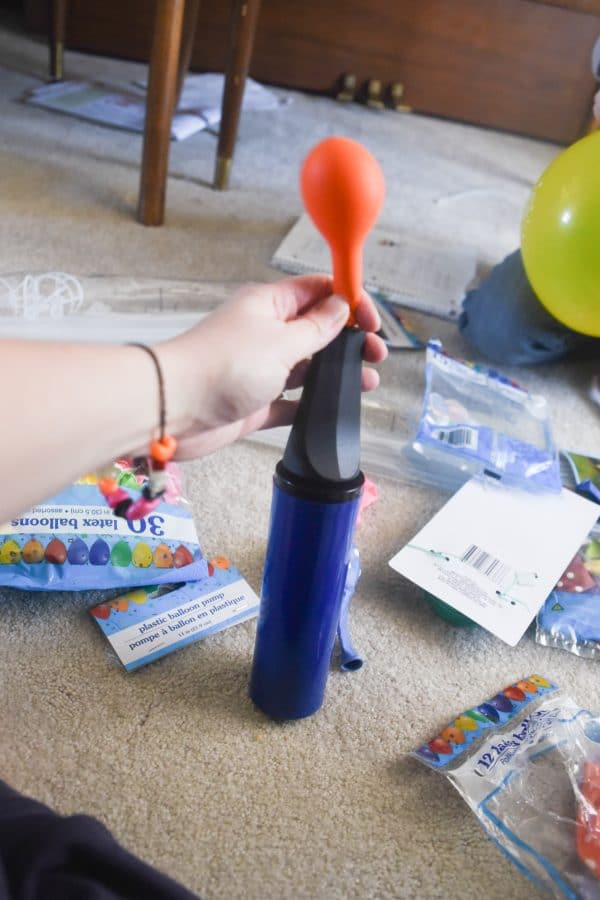 blowing up a balloon with dollar tree balloon pump